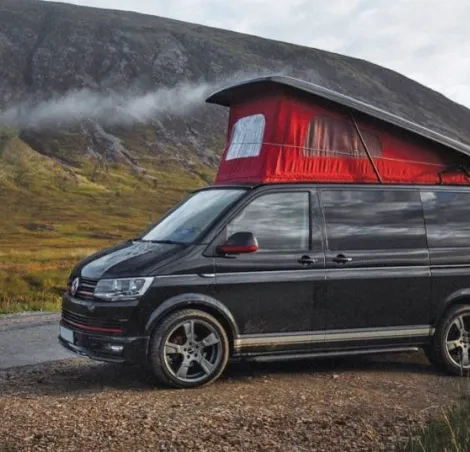Campervan by mountains