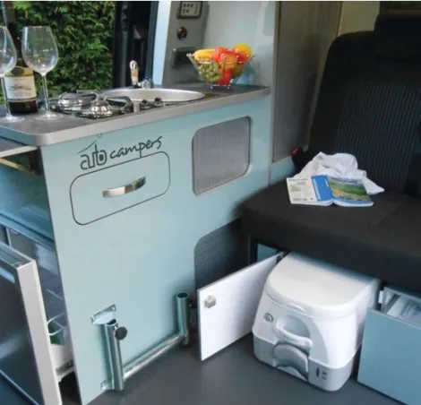 A portable toilet drawer inside an Auto Camper leisure van