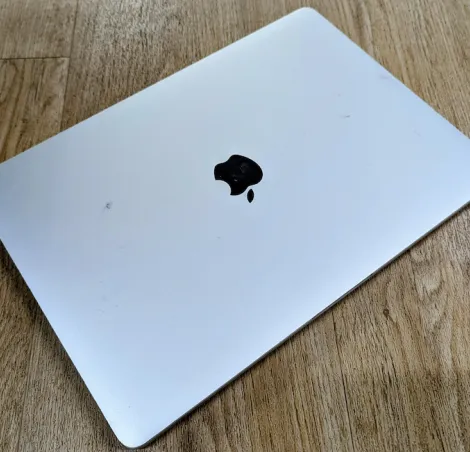 The laptop landed on the floor relatively unscathed