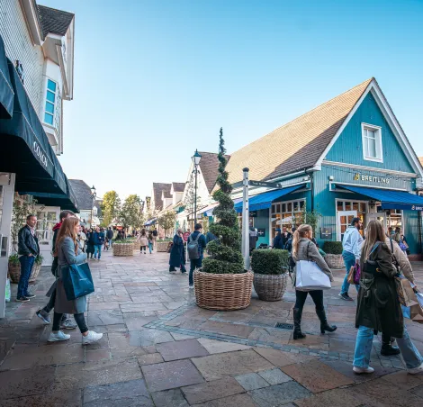 Bicester Village outlets, London - 14 October 2023 : Tourists visiting and shopping in one of UK largest outlets - Bicester village