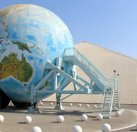 The Globe Caravan, a world sized caravan featuring nine guest rooms and nine bathrooms