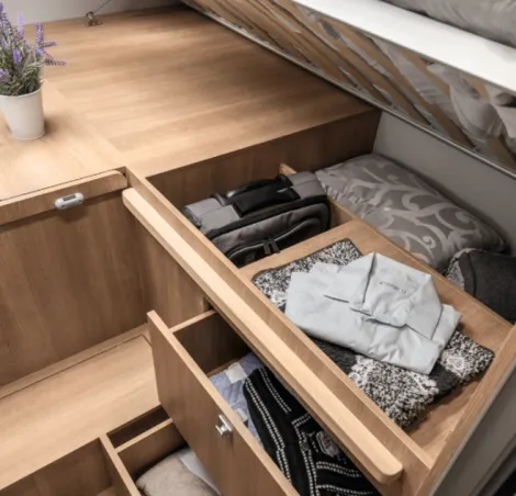 The bed storage inside the Giottiline Toscan 69GC