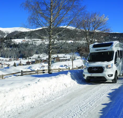 Driving a Bailey Alora motorhome along a snowy road
