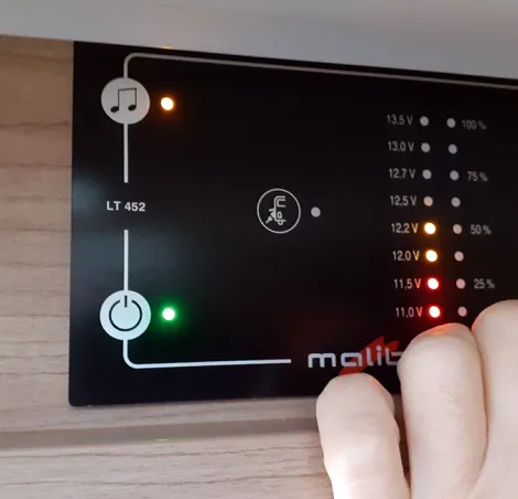 Checking a motorhome battery levels on the control panel