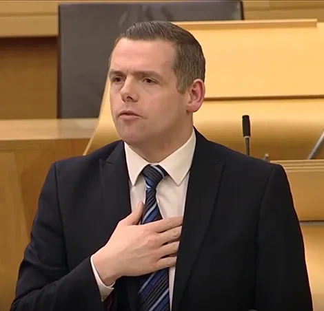 Douglas Ross MSP speaking about campsites at the Scottish parliament