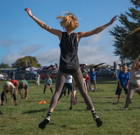 woman doing starjump