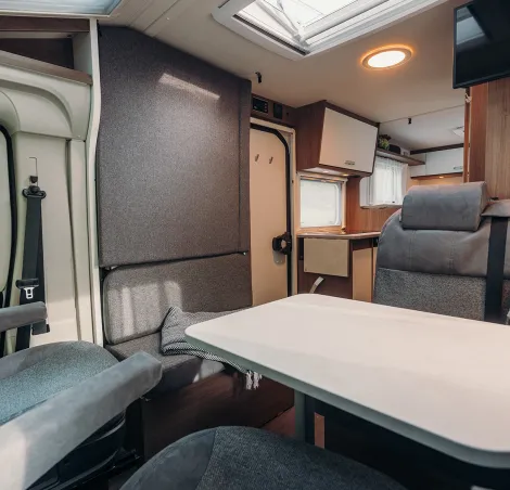 Carado V347 from the cab showing the lounge bed that drops down from the wall