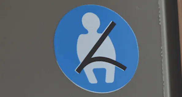 Motorhome seatbelt sticker on seat base