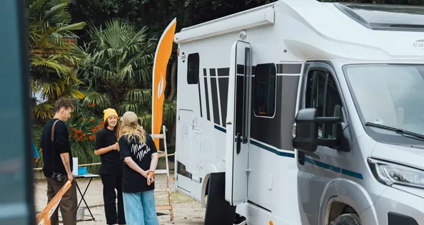 People looking at Carado motorhome