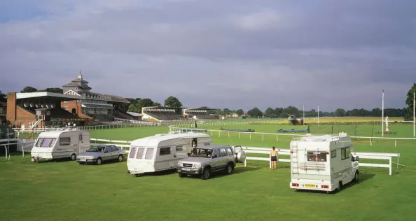 caravans pitched near a race course