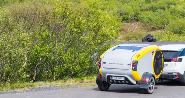 A Mink Camper being towed